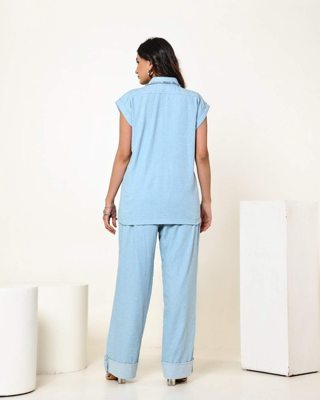 The Light Denim Sleeveless Flap Embellished Shirt