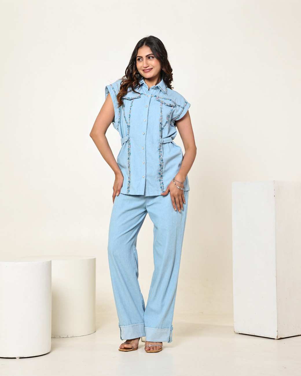 The Light Denim Sleeveless Flap Embellished Shirt